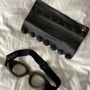 Black leather hair wrap accessory w/ 7 snaps & pony hook; Black unisex goggles.